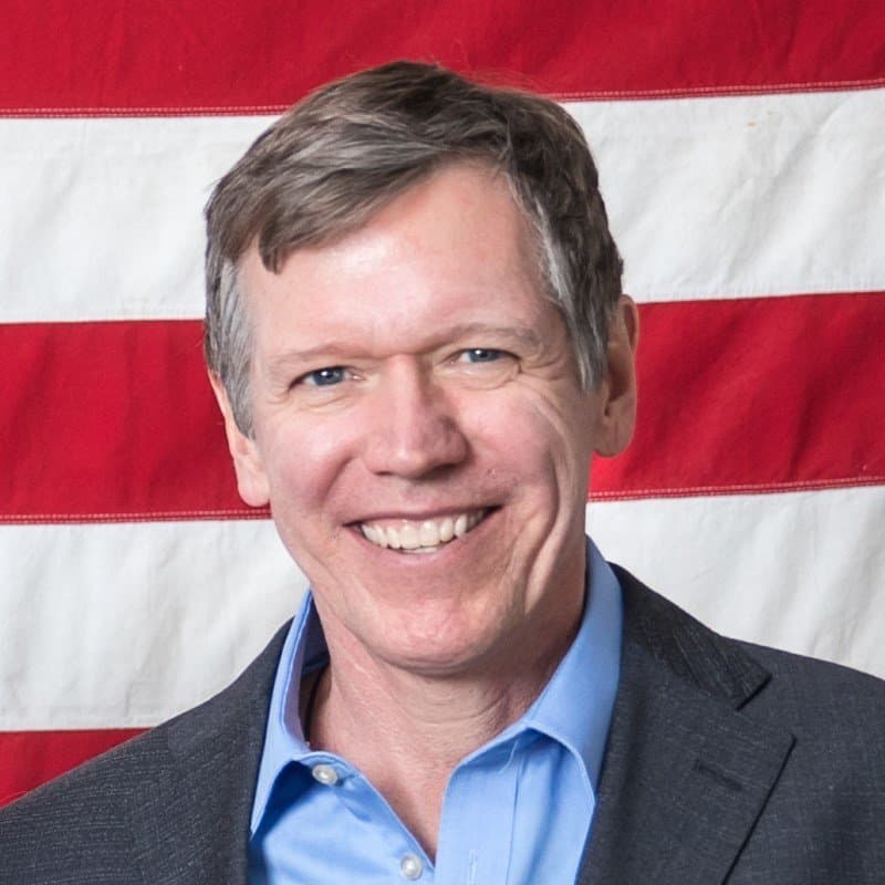 Stephen Headshot with American Flag Background
